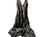 a black dress hanging on a hanger on a white background