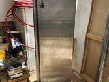 an image of a stainless steel refrigerator in a kitchen