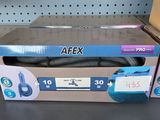 une photo d'une boîte de produits AEX posée sur une étagère dans un magasin