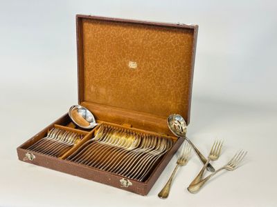 a wooden box with silverware in it on a table