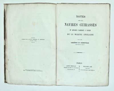 un livre ouvert sur une table, sur fond blanc