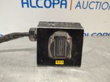 a close up of an electronic device on a table