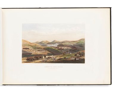 a book with a picture of a view of a town in the distance