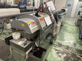 une image représentant une machine dans une usine où se trouvent de nombreuses machines