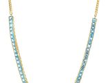 un collier en or orné de perles bleues et d'une chaîne en or