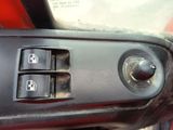 a close up of a car ' s dashboard with the control buttons