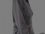 an image of a mannequin wearing a gray jacket and black pants