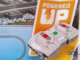 a box with a toy train on it that is in the box