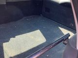a view of the back of a car with its trunk open