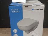 box of geberit renova toilet sitting on top of a wooden table