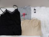three women ' s underwear are laid out on a white surface