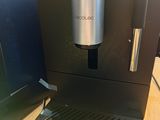 a coffee machine that is sitting on a table