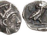a silver coin with an image of a man on it