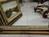 a large mirror with a picture on it in a store