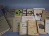 a lot of books that are sitting on a table