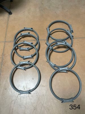many different types of hose clamps laid out on the floor