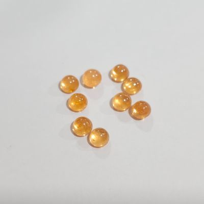 fish oil capsules on a white surface