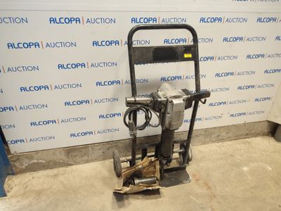 an image of a machine that is sitting in front of a wall