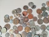 a lot of coins that are on the table