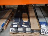 many different types of wood on the shelves in the store