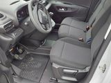 the interior of a car with a steering wheel and a dashboard