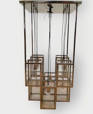 EICHHOLTZ. Lustre modèle Ferguson composé de 8 suspensions c…