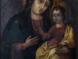une peinture représentant une femme tenant un enfant dans ses bras