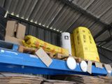 a large amount of boxes on a shelf in a warehouse