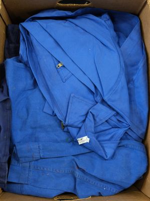 a box with a blue shirt inside of it