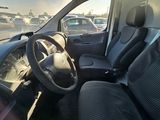 a view of the inside of a car from the driver ' s seat