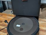 an image of a robotic vacuum cleaner on a wooden table