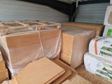 a lot of boxes that are sitting in the back of a truck