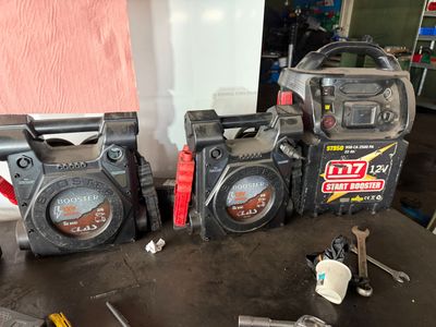 three different types of tools sitting on a table