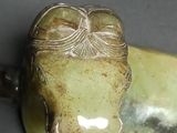 a figurine of a lion made out of stone