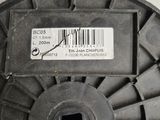 a spool with a barcode on it sitting on a table