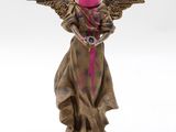 an image of a statue of an angel with pink paint on it