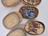 several small boxes with different types of buttons in them