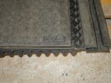 several pieces of metal are stacked on top of a wooden pallet