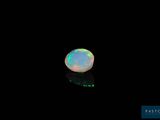 a white oplite in a black background