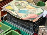 a pile of books and other items on a table