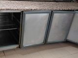 an image of a kitchen with granite counter tops and stainless steel appliances