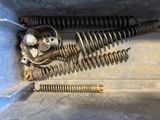 a close up of a couple of springs and springs in a container