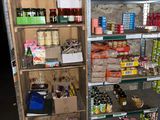 many shelves of food and drinks in this room
