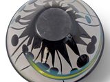 a black and white plate with a design on it