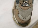 a close up of a pair of shoes on a table