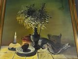 a picture of a painting of fish and flowers on a table