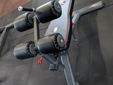 a machine that is sitting on the floor in the gym