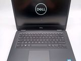 the dell laptop is open and ready to be used