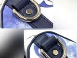 two pictures of a blue and white purse with a metal ring