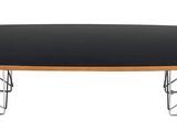 an image of a round table with a black top and metal legs